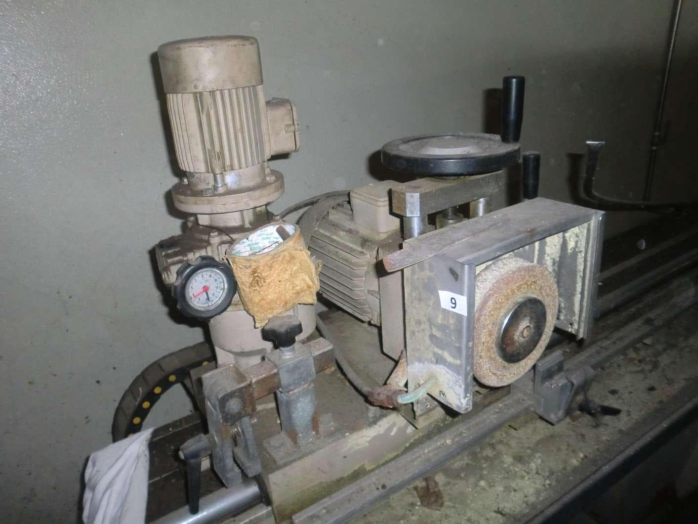Máquina de afiar lâminas sem marca visível — imagen 2