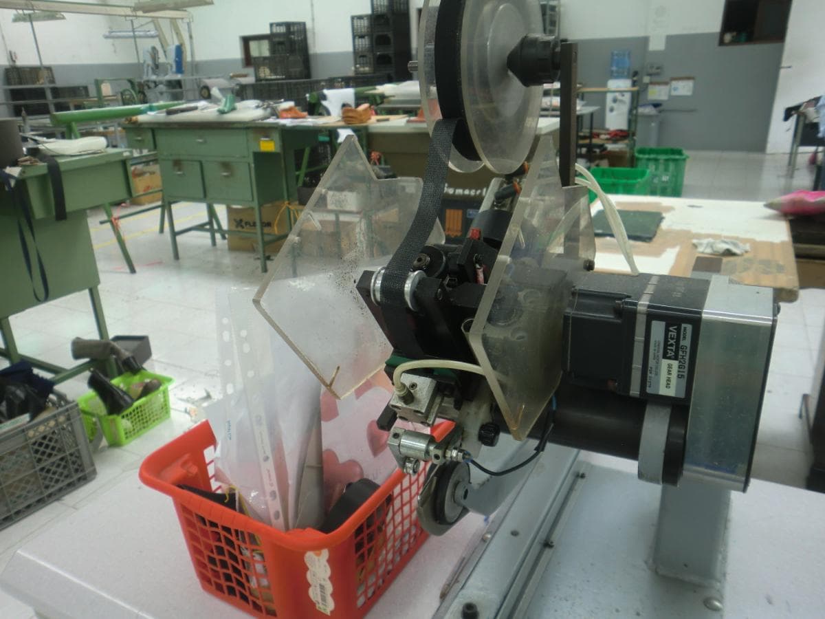 Máquina de colocar fita