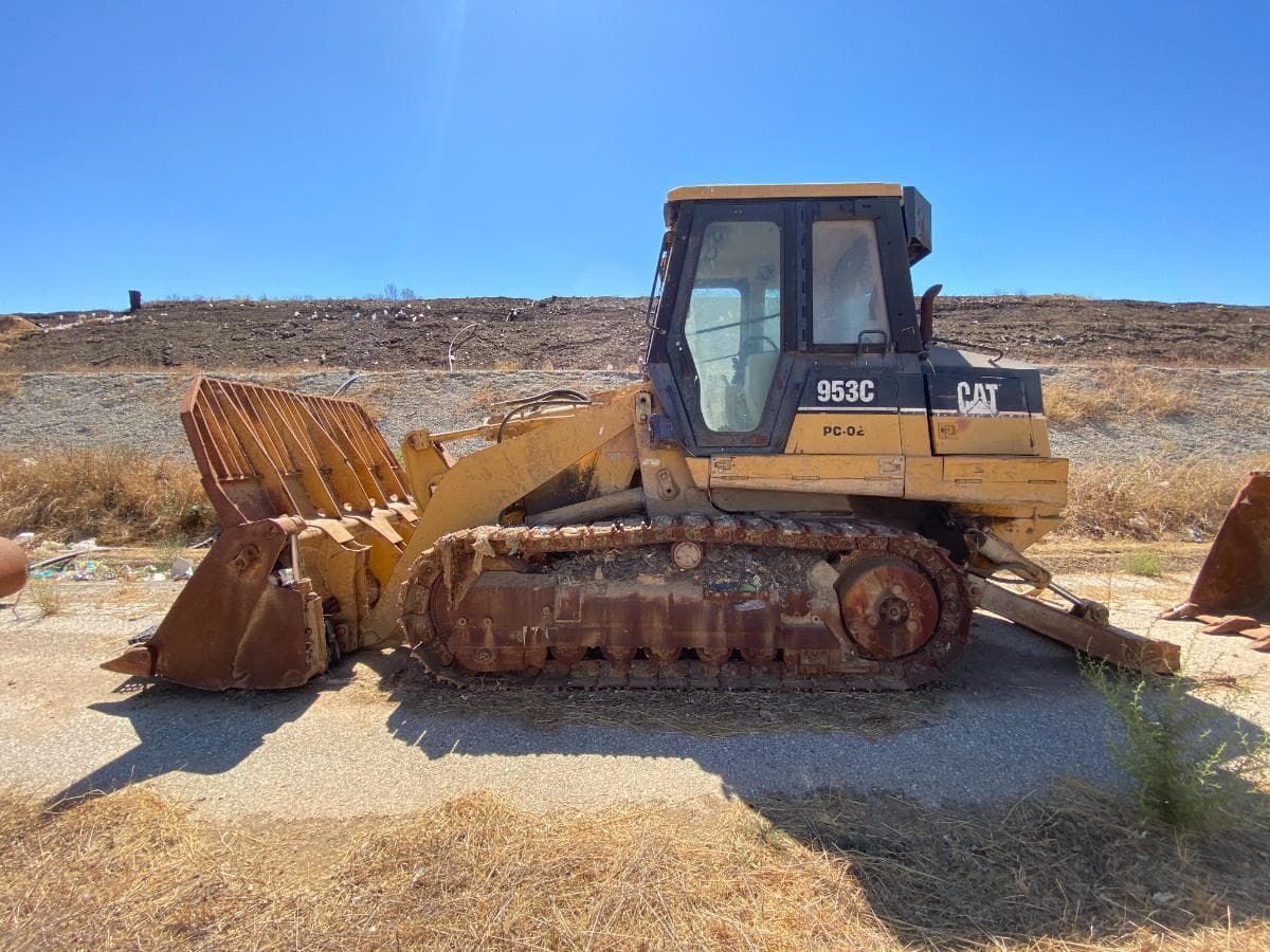 Pá de rastos Caterpillar 953C · Avis