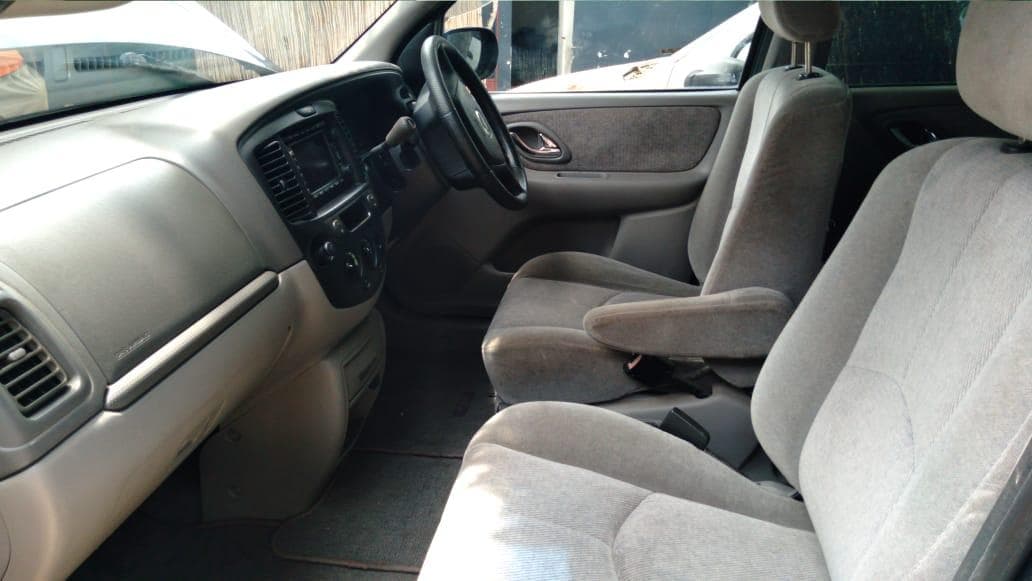 Mazda Tribute 2.0 · — image 2