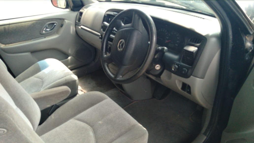 Mazda Tribute 2.0 · — image 4