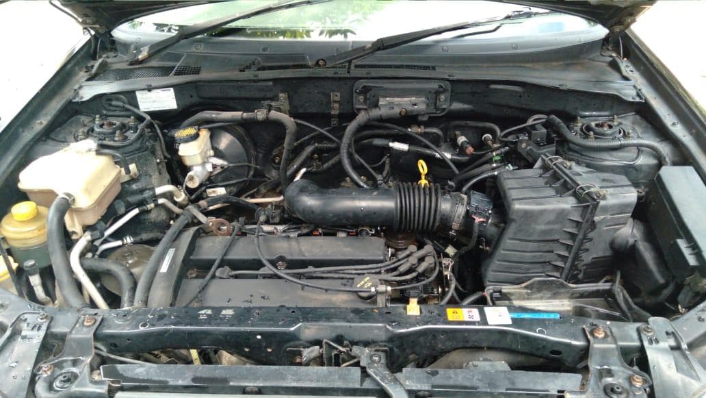 Mazda Tribute 2.0 · — image 10