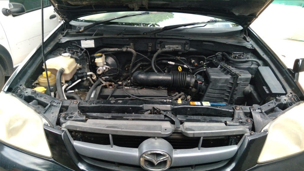 Mazda Tribute 2.0 · — image 12