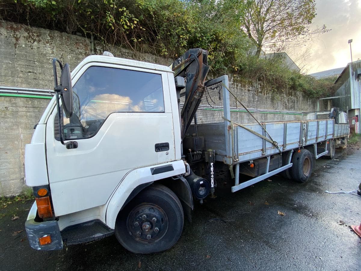Mitsubishi Canter c/ grua — imagem 1