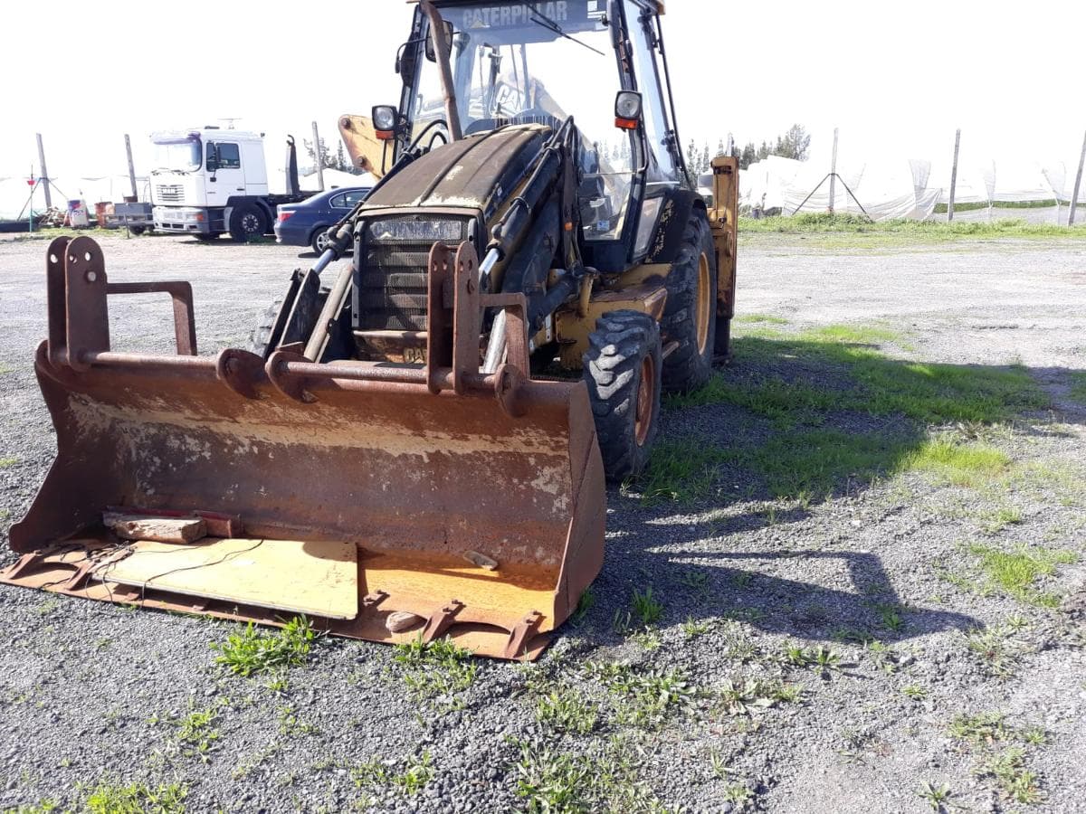 Mixta retroescavadora Cat 428 — imagem 2