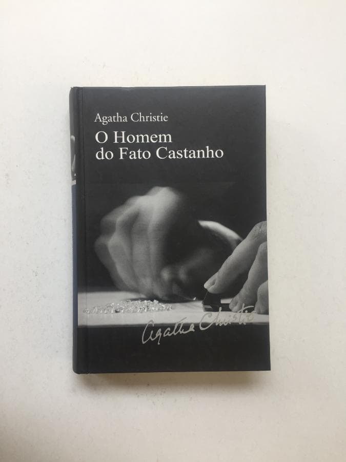 O Homem de Fato Castanho