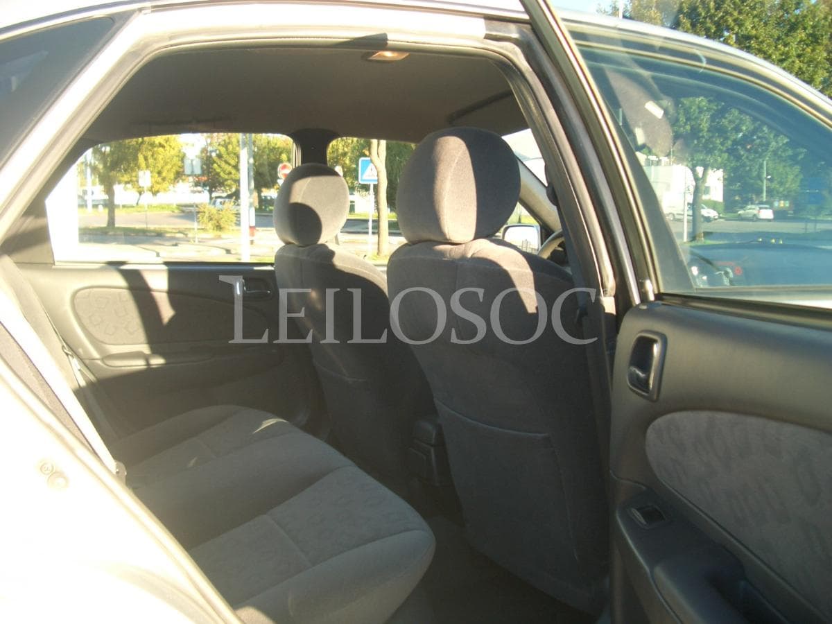 Toyota Corolla Liftback 1.4 VVTI · 16v · 95cv · Ano 2000 — image 14