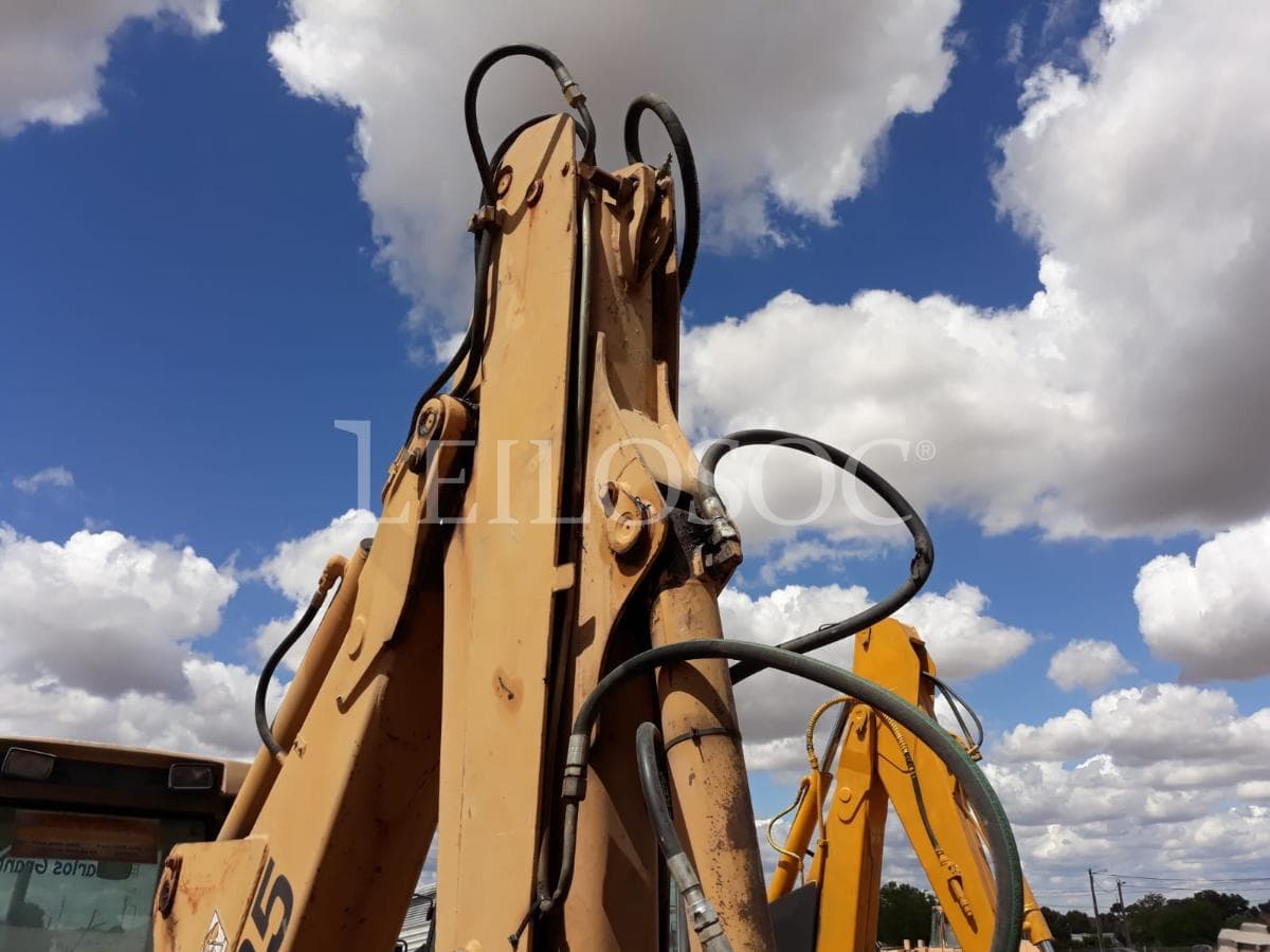 Rectro excavadora New Holland NH95 — imagem 4