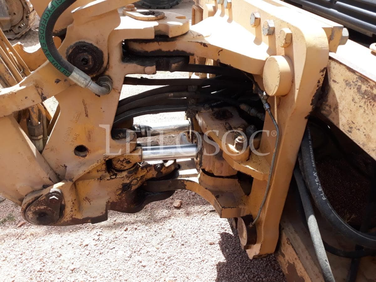 Rectro excavadora New Holland NH95 — imagem 7