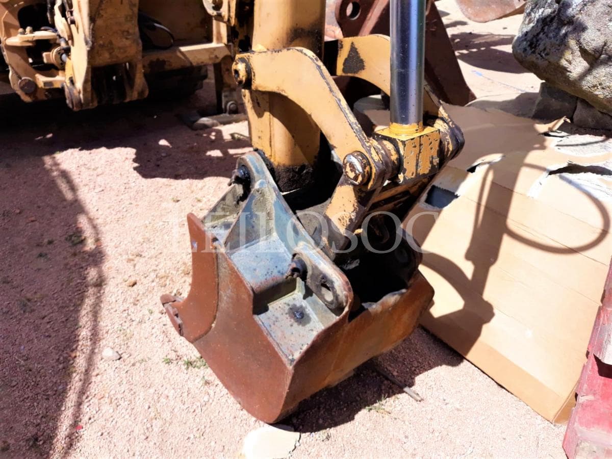 Rectro excavadora New Holland NH95 — imagem 11