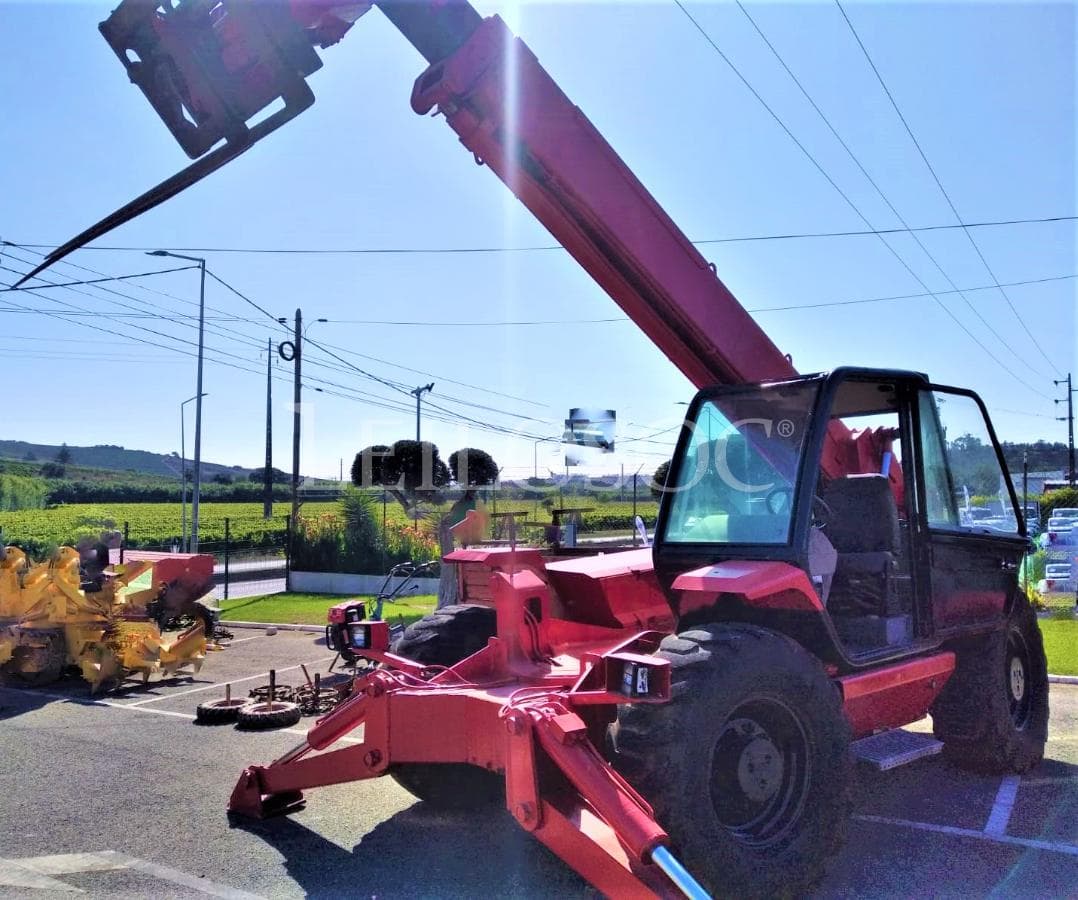 Telescopica Manitou 12m — imagem 1