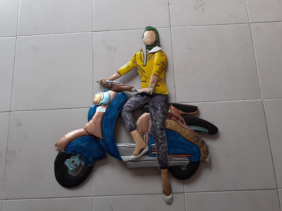 Figura em Metal