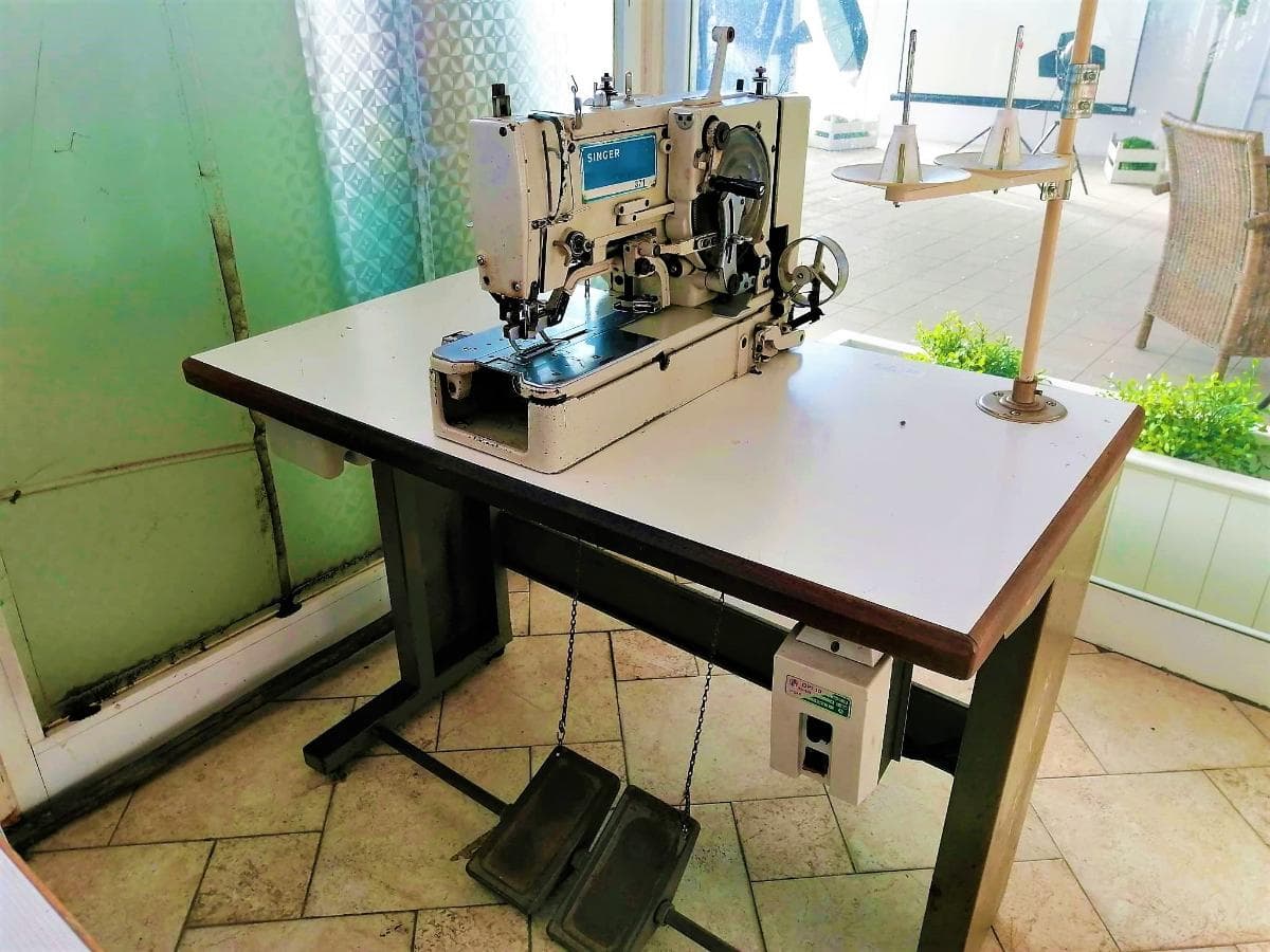 Máquina de casear Singer