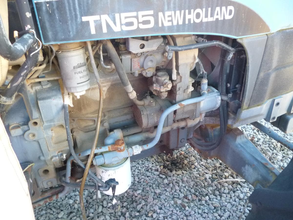 Bedford NKR + Trator NEW HOLLAND TN 55 + Reboque com cuba em inox — imagen 17