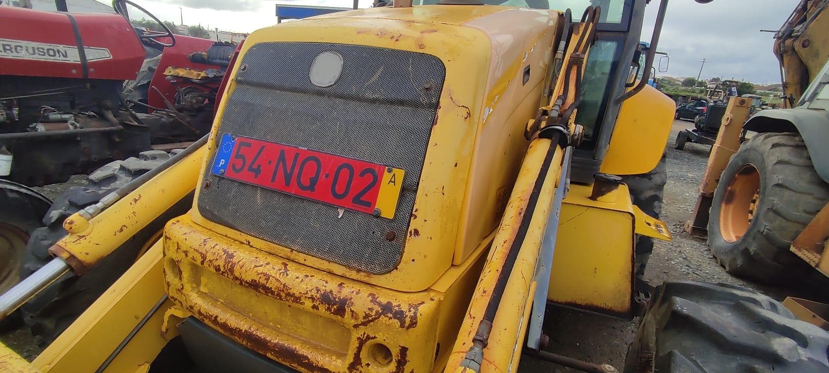 Retro Escavadora New Holland LB 95 — imagem 5