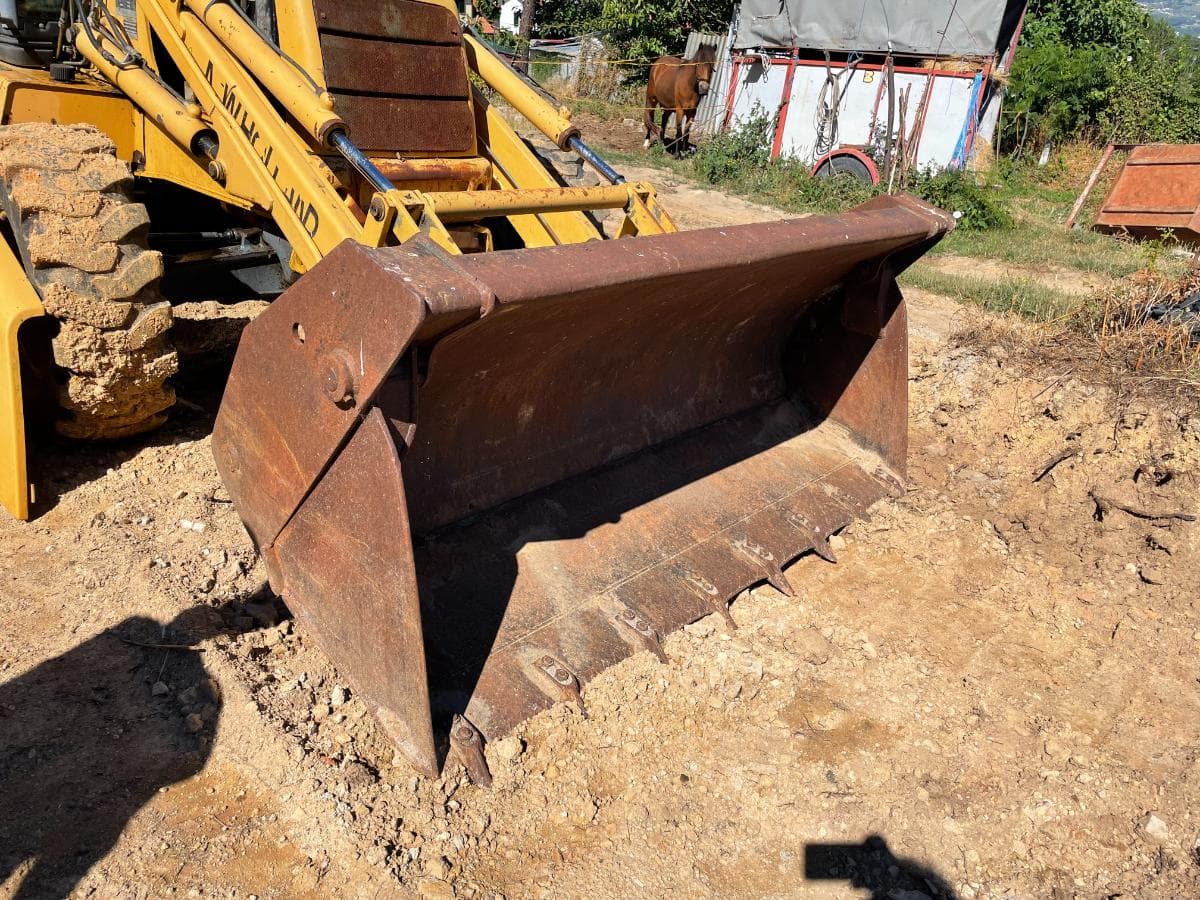 Retroescavadora New Holland NH 95 — image 8