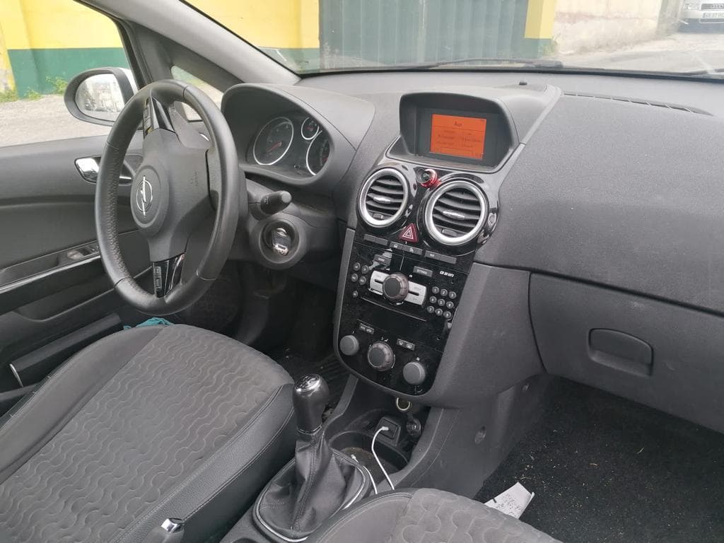 Opel Corsa 1.3CDTI · Ano 2013 — imagem 19