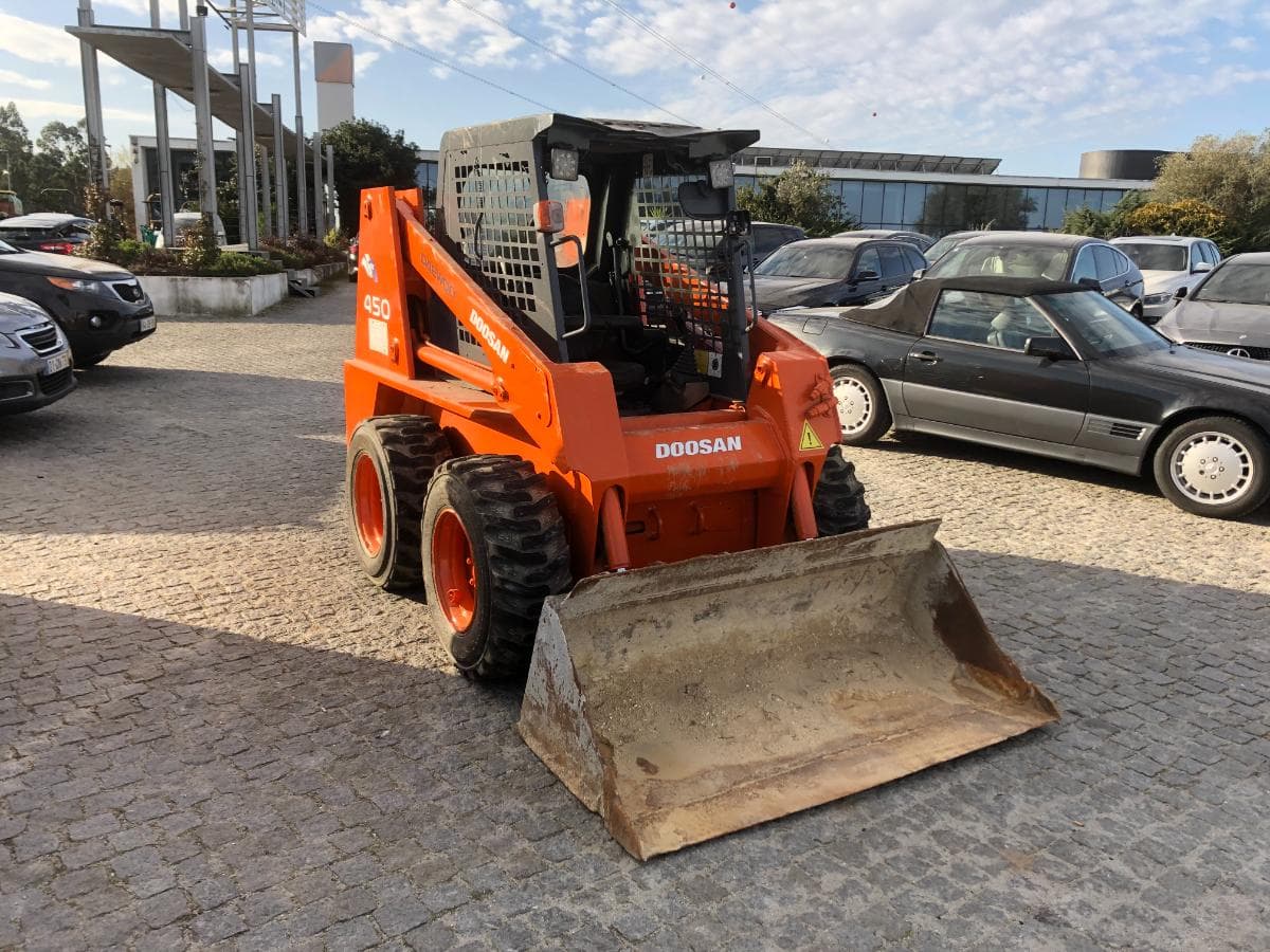 Mini Pá Carregadora Doosan 450 PLUS · Ano 2006 — image 1