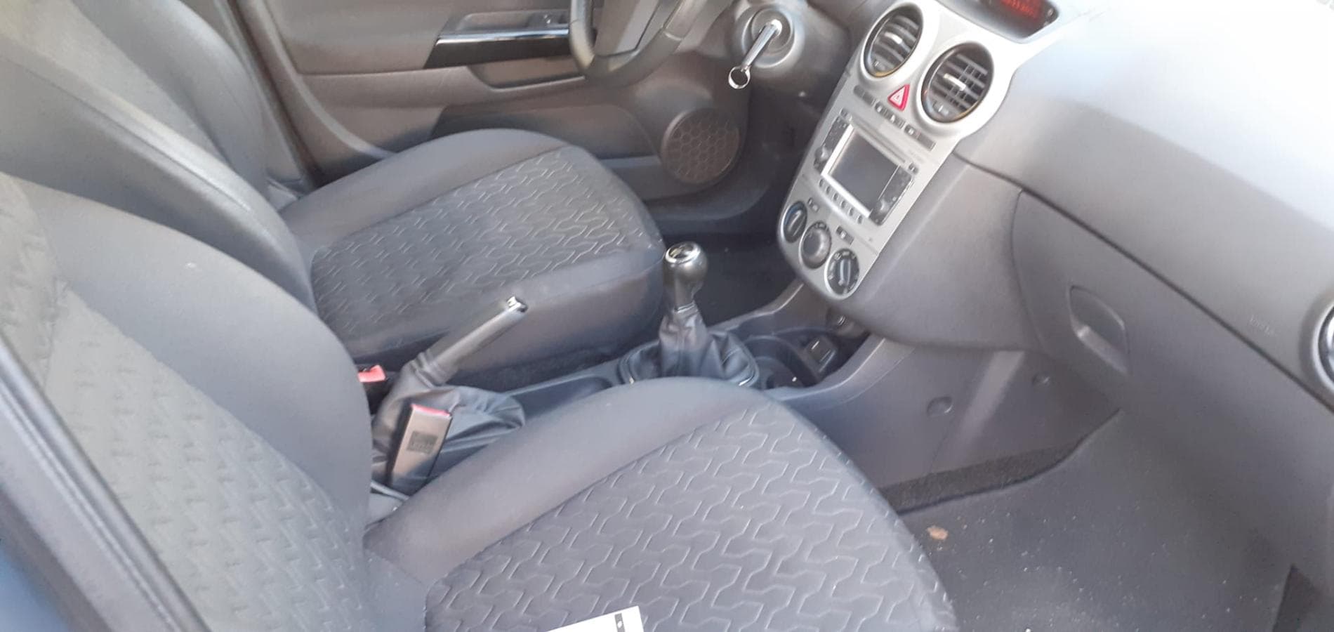 Opel Corsa 1.3CDTI · Ano 2013 — imagen 16