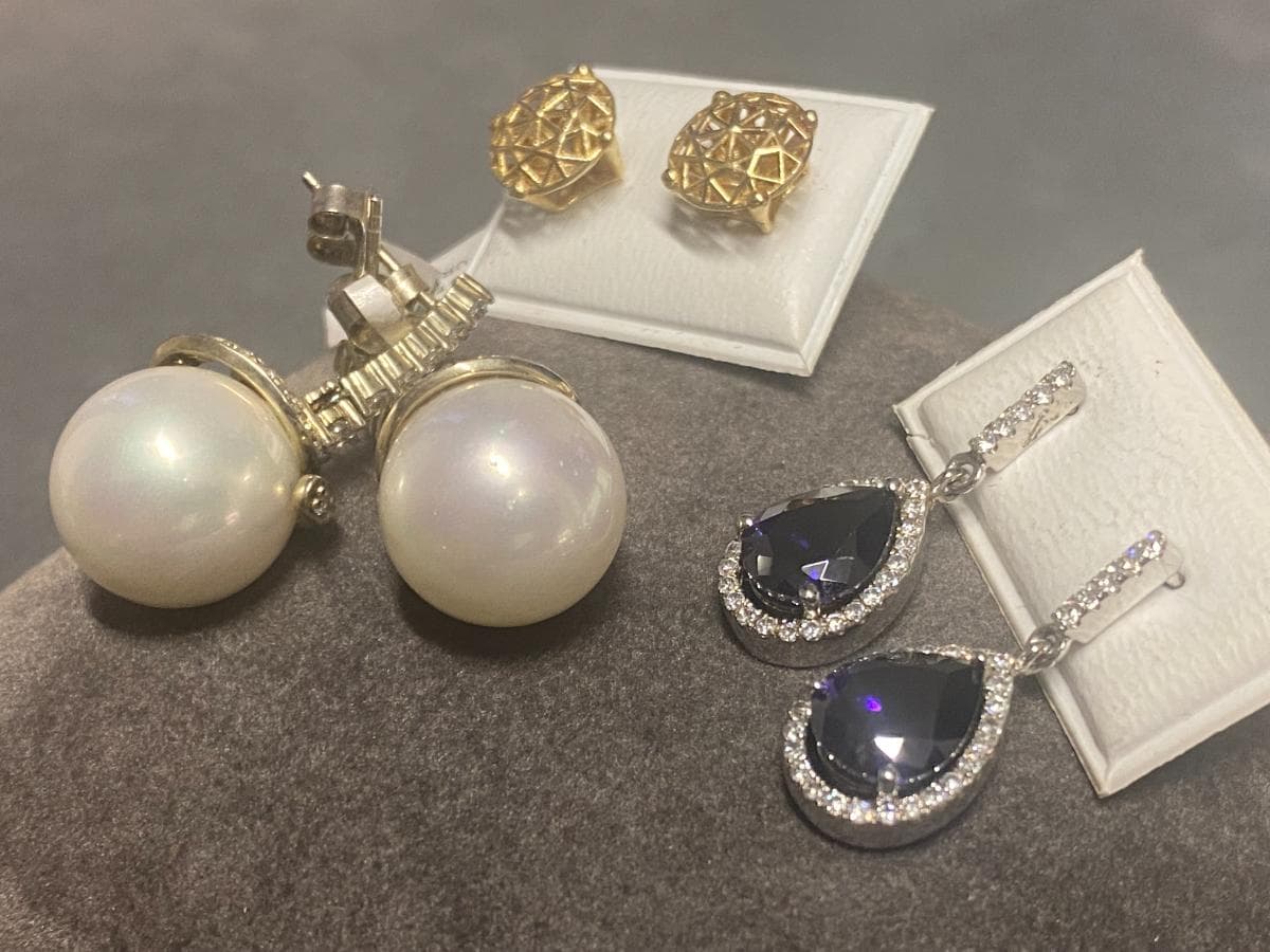 Earrings in silver and other materials — image 1