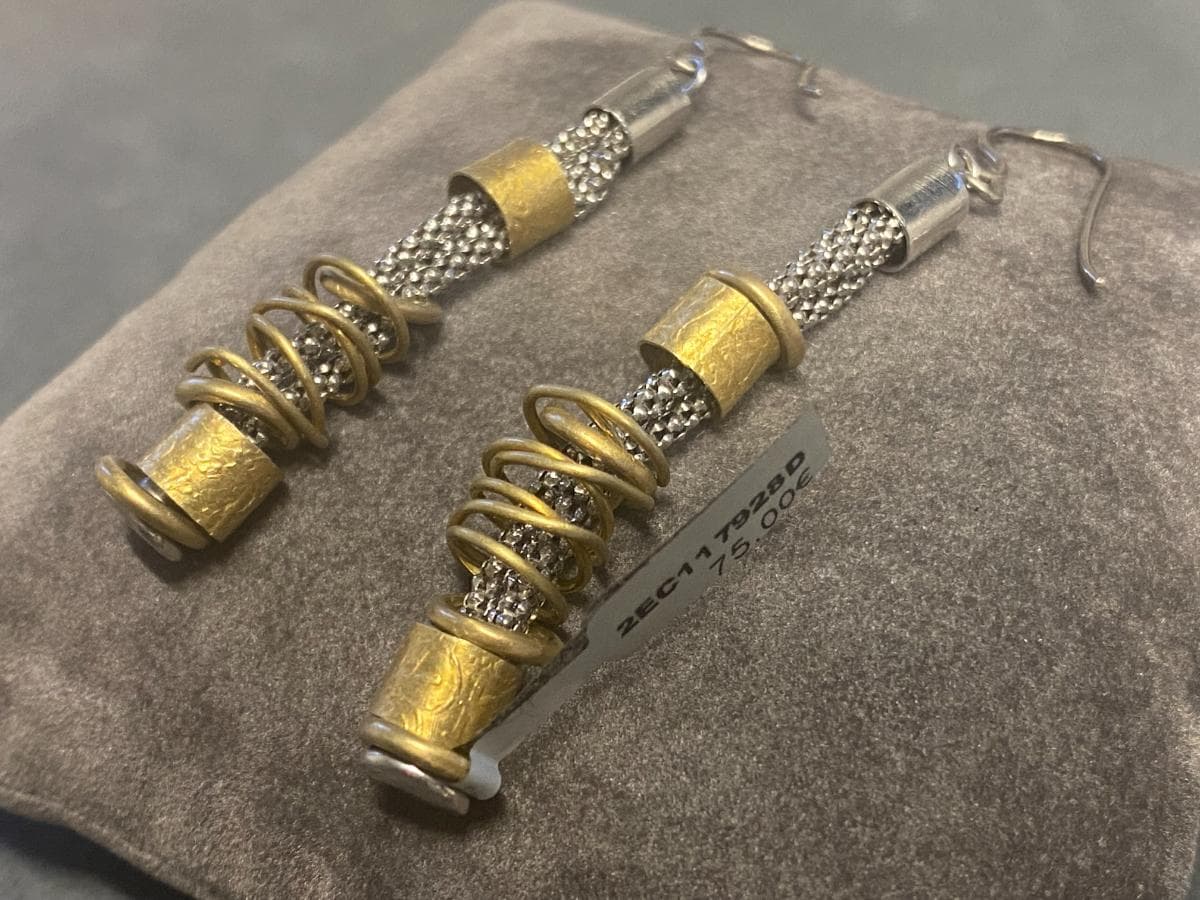 Earrings in silver and other materials — image 1