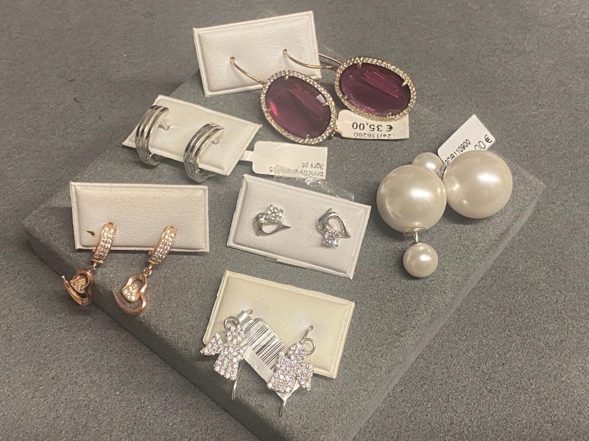 Earrings in silver and other materials — image 1