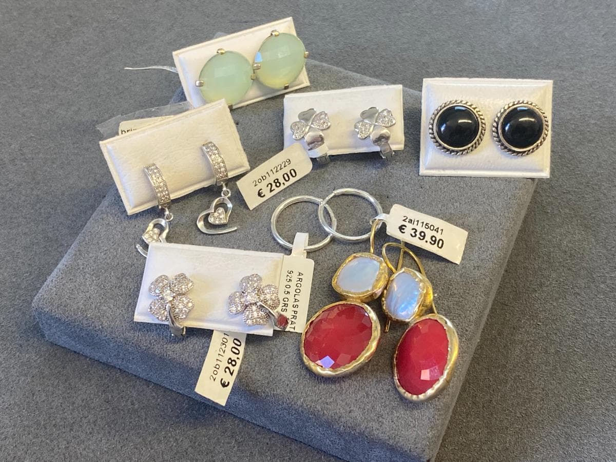 Earrings in silver and other materials — image 1