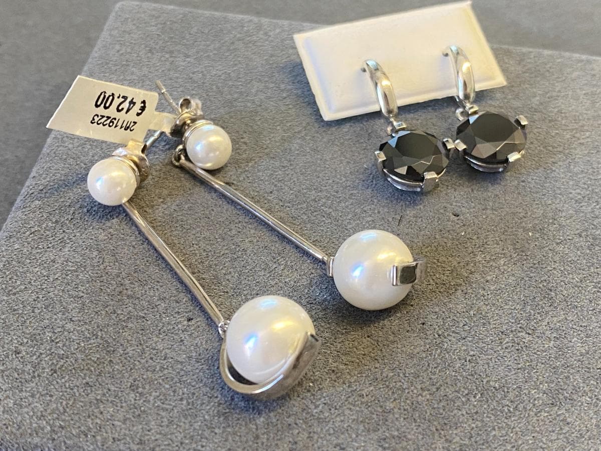 Earrings in silver and other materials — image 1