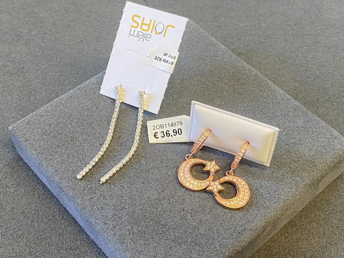 Earrings in silver and other materials — image 1