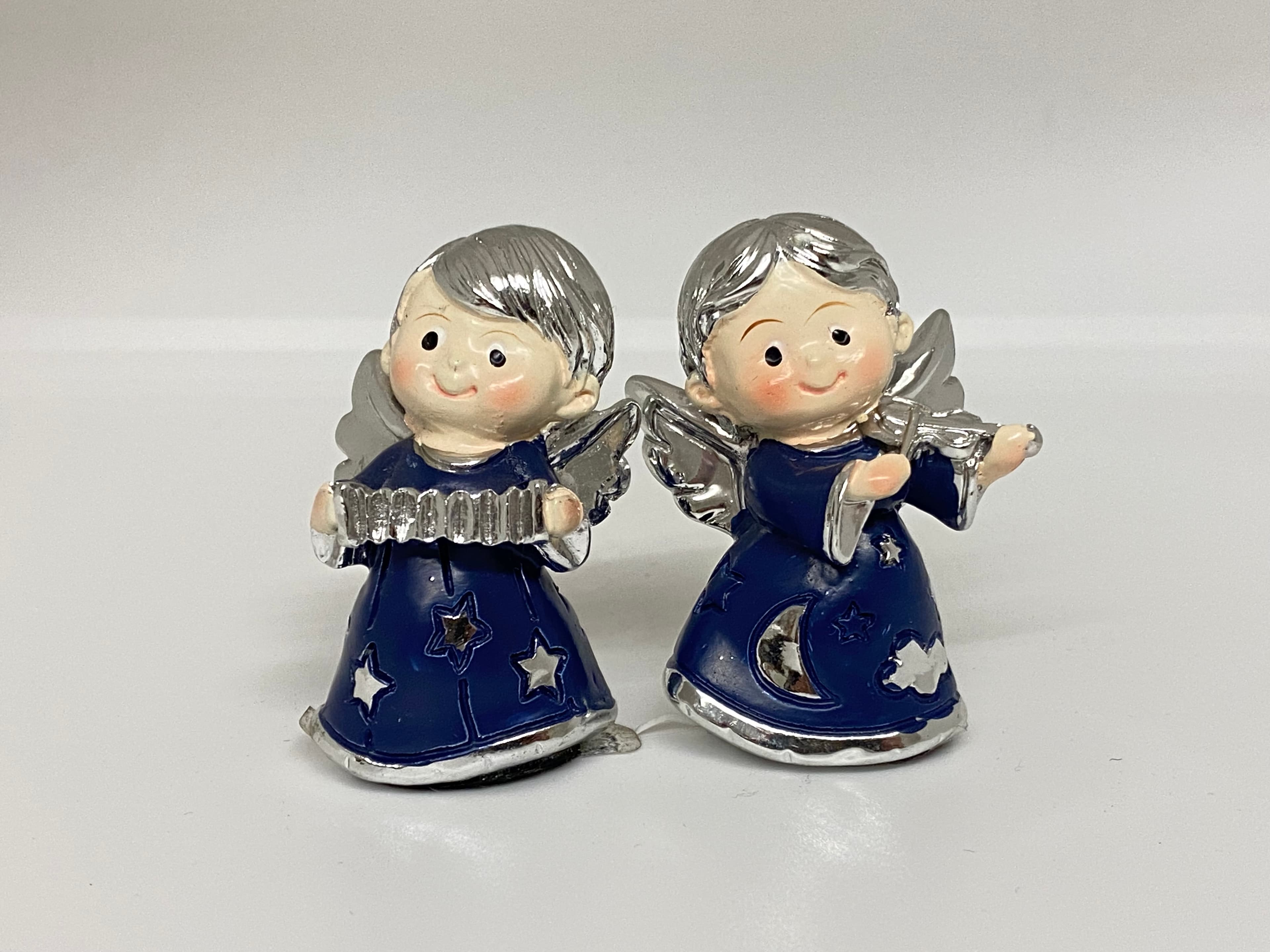 Dois anjos com instrumentos musicais — image 1