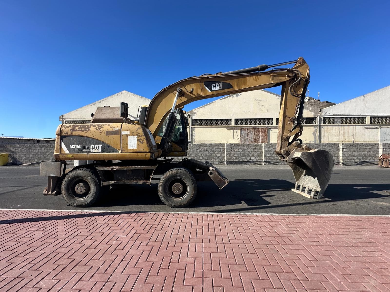 Escavadora de Pneus CATERPILLAR M315D — image 5