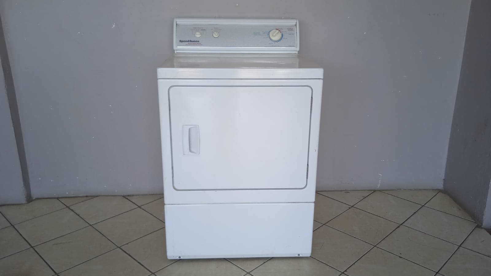 Máquina de secar roupa