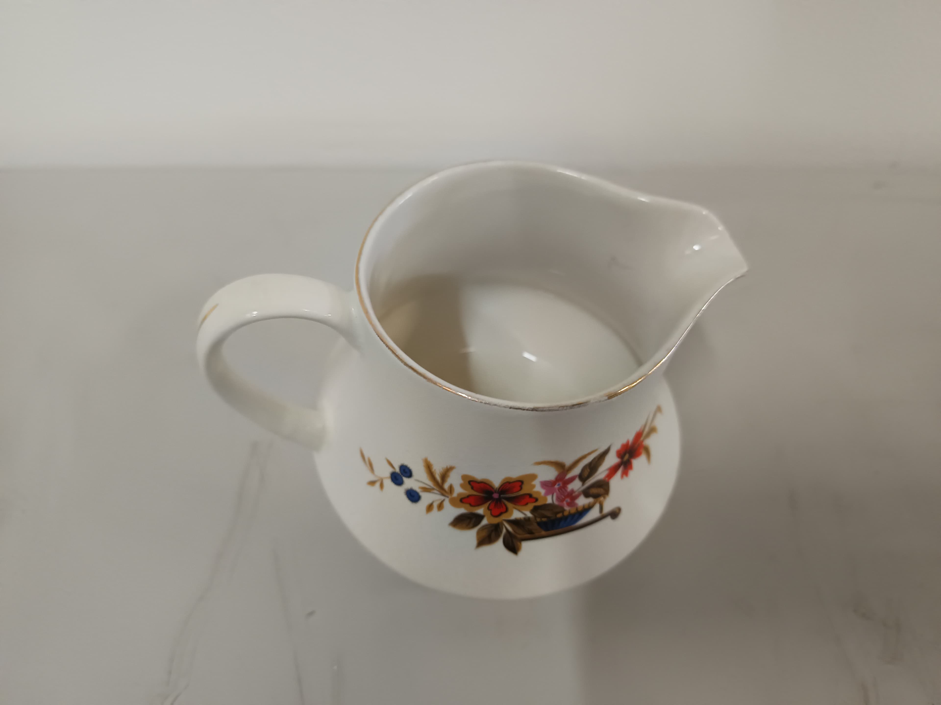 Leiteira em porcelana — image 3