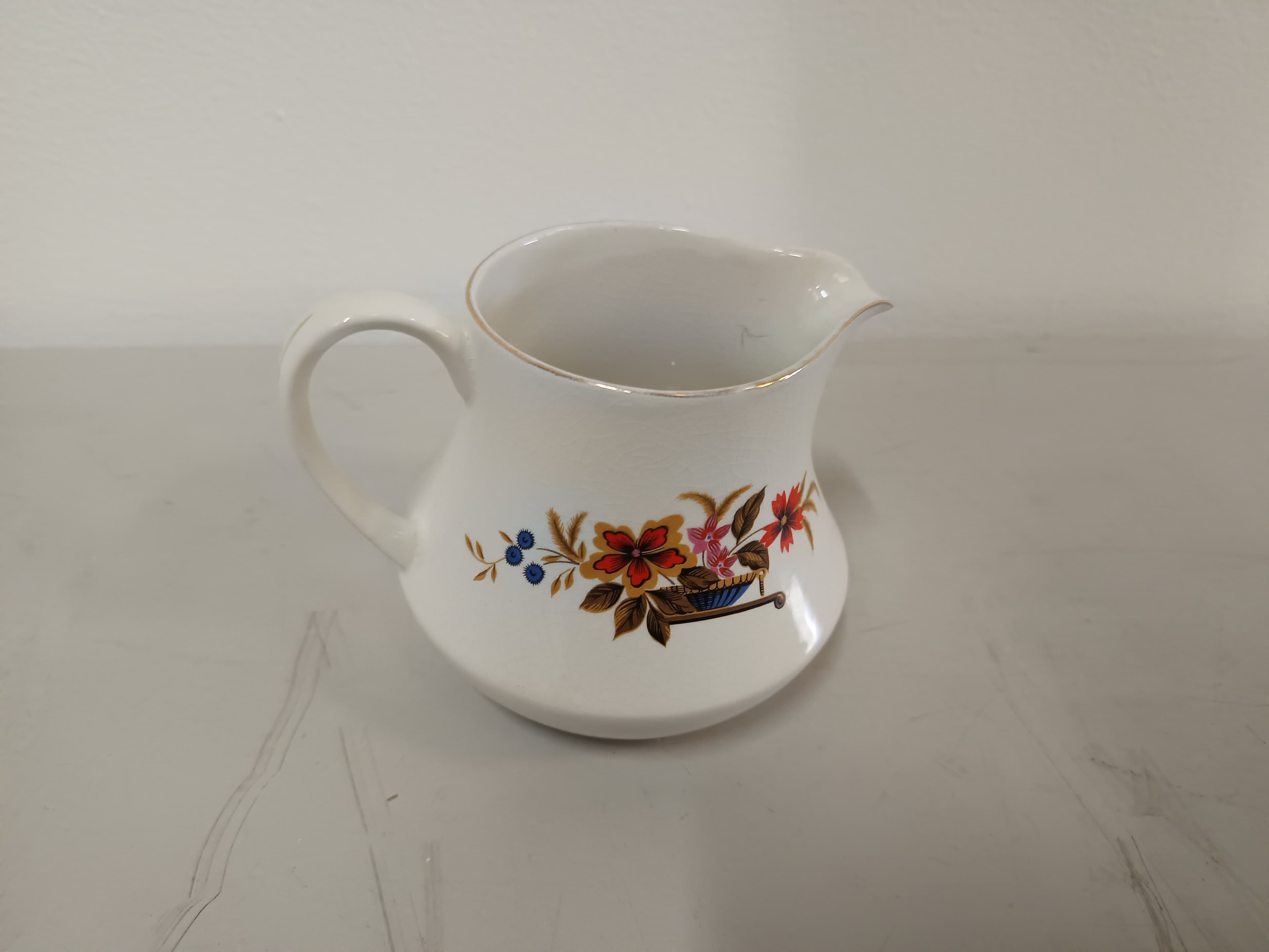 Leiteira em porcelana — image 2