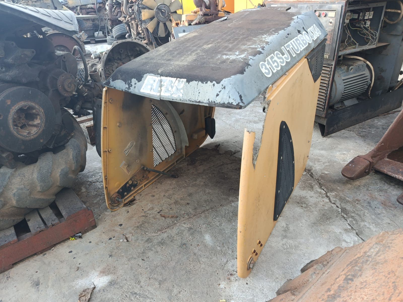 Bell backhoe bonnet
