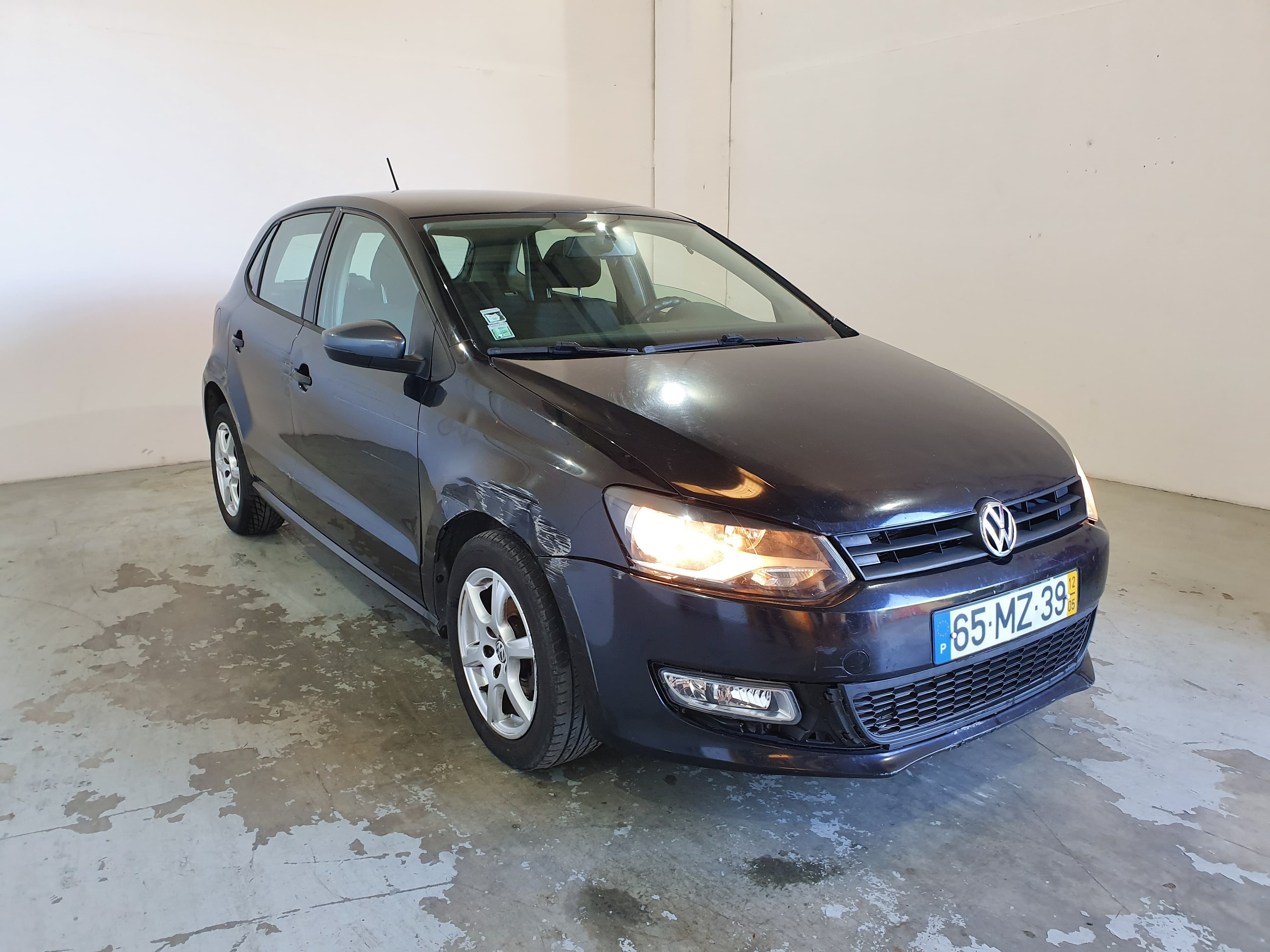 Volkswagen Polo 1.2 TDI · Ano 2012  65-MZ-39