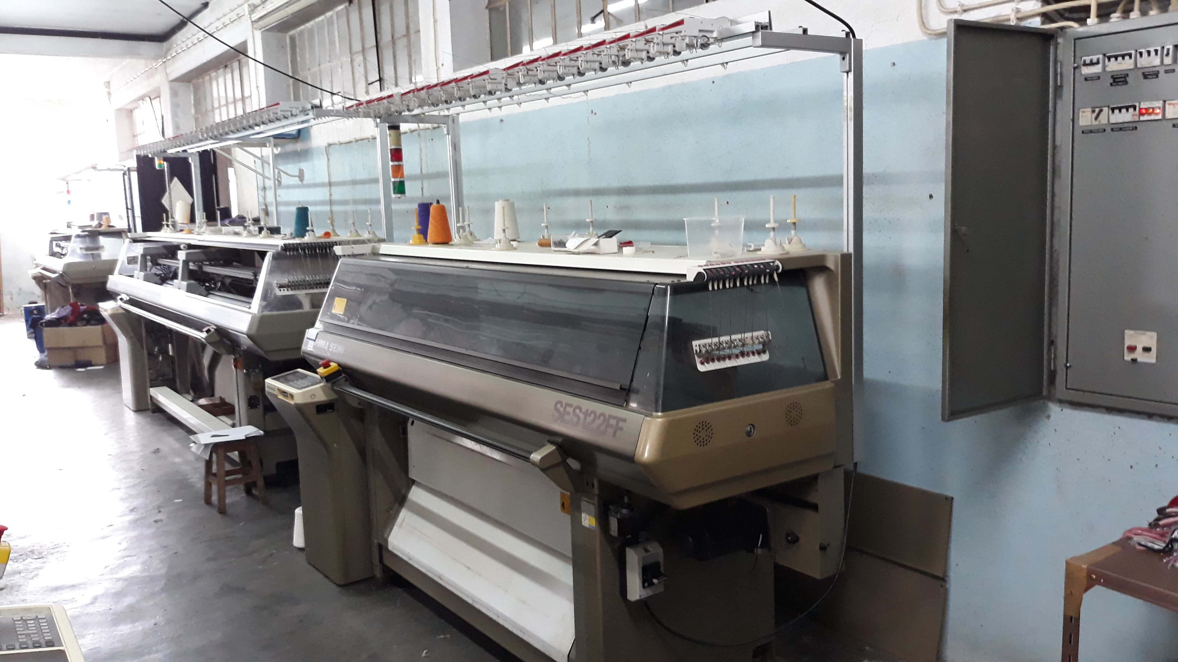 Máquina industrial de confeção de malha