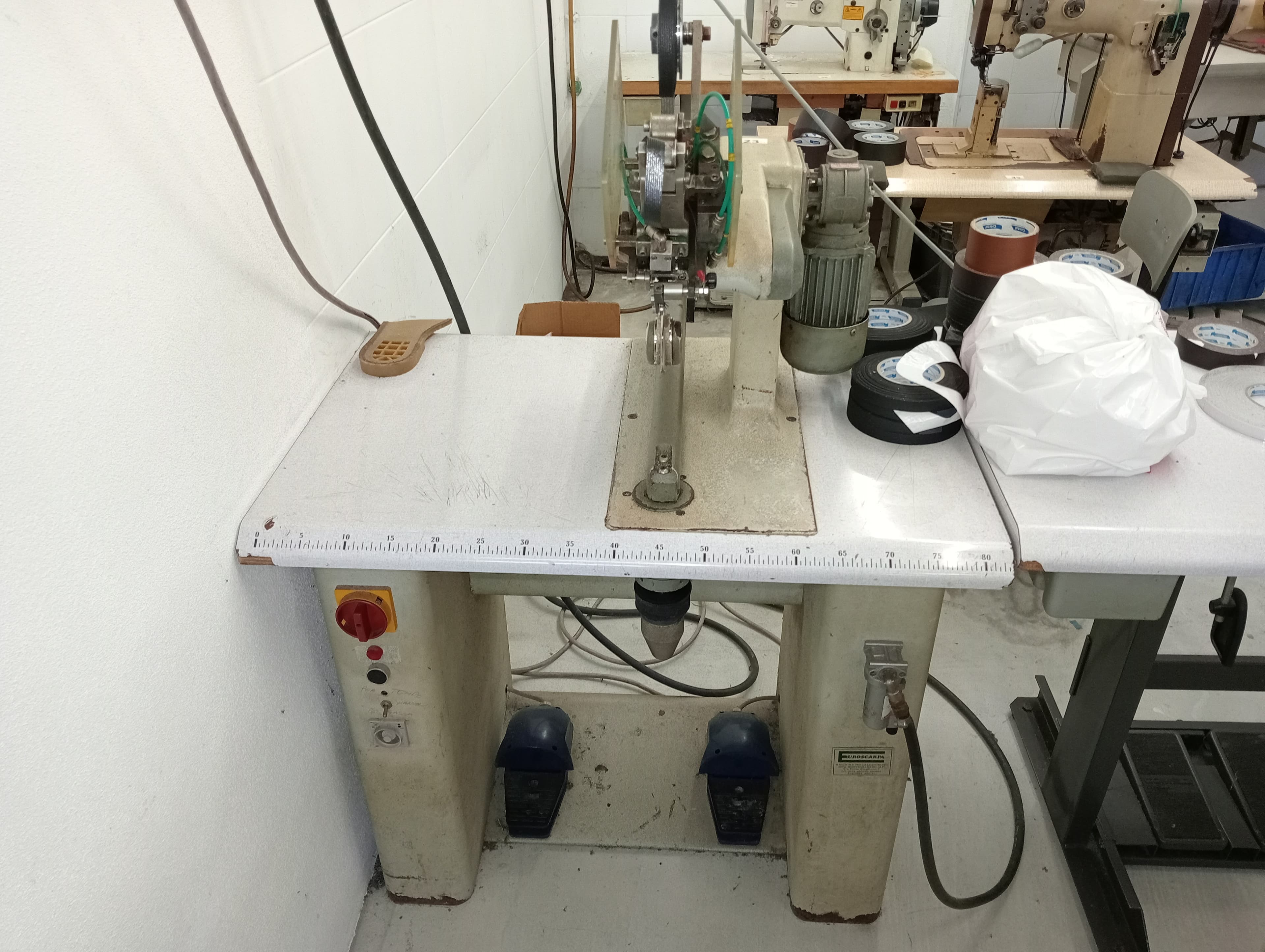 Máquina de abrir costuras