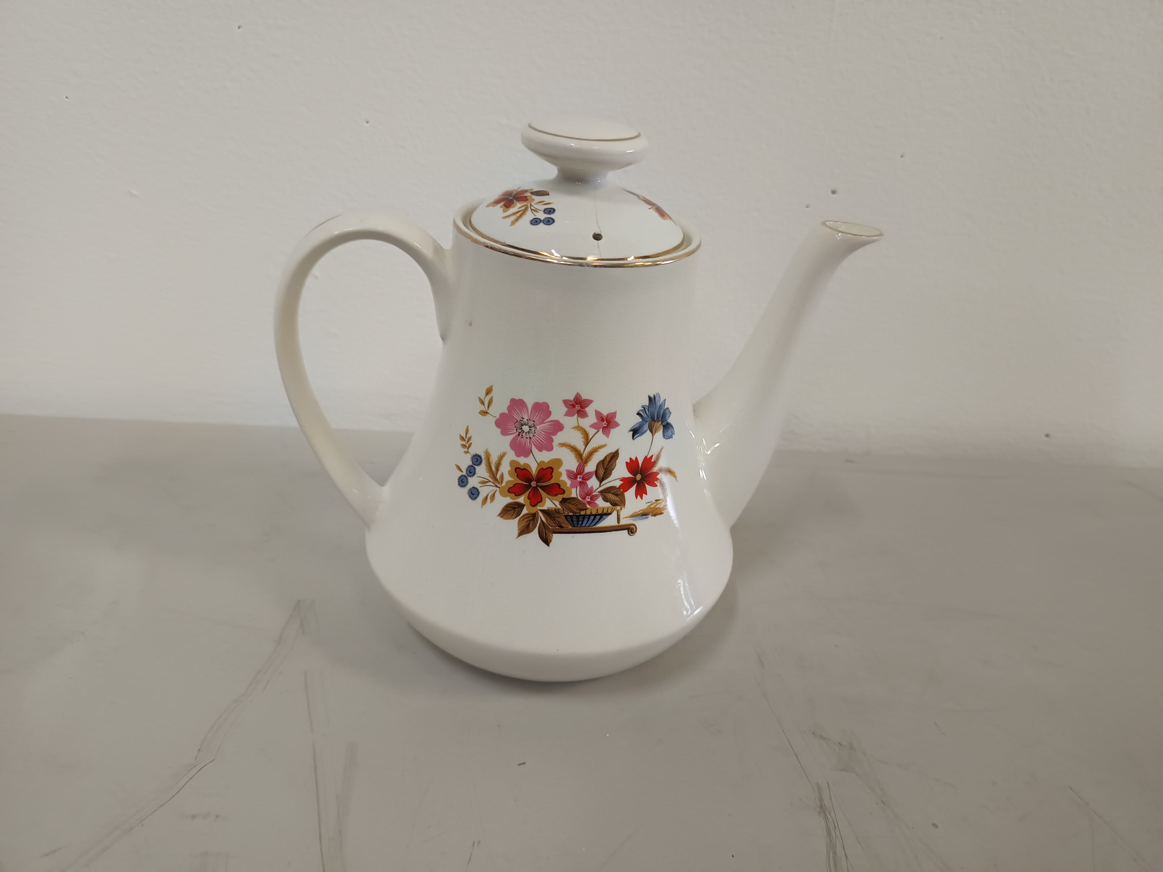 Bule de chá em porcelana
